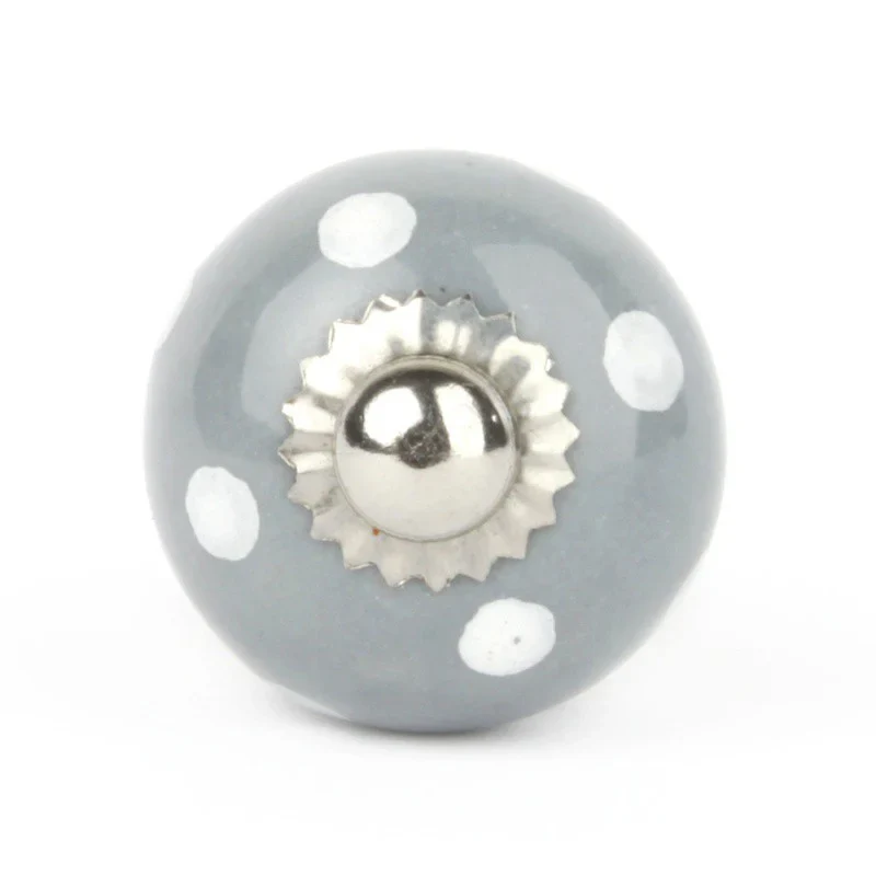 Petit bouton en céramique grise à pois blancs