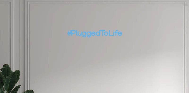 Custom text: #PluggedToLife