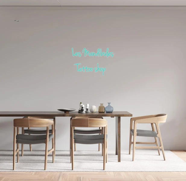 Custom text: Les Mandibules Tattoo shop