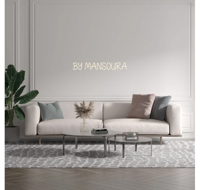Custom text: BY MANSOURA