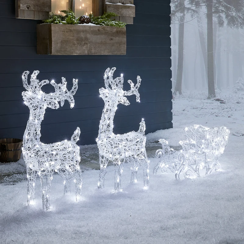 Rennes de Noël avec Traîneau Lumineux Swinsty à LED Bicolores