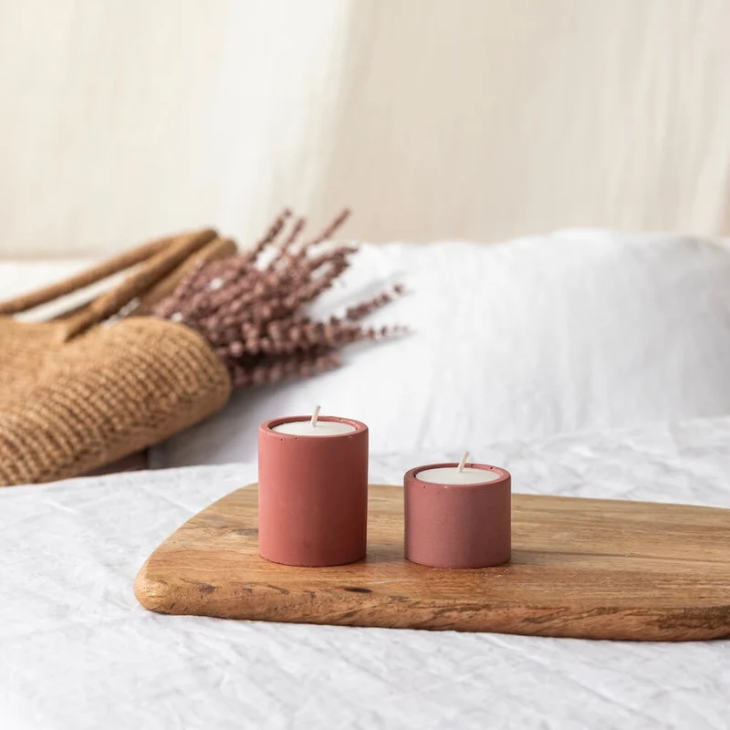 Duo de bougeoirs en béton rose