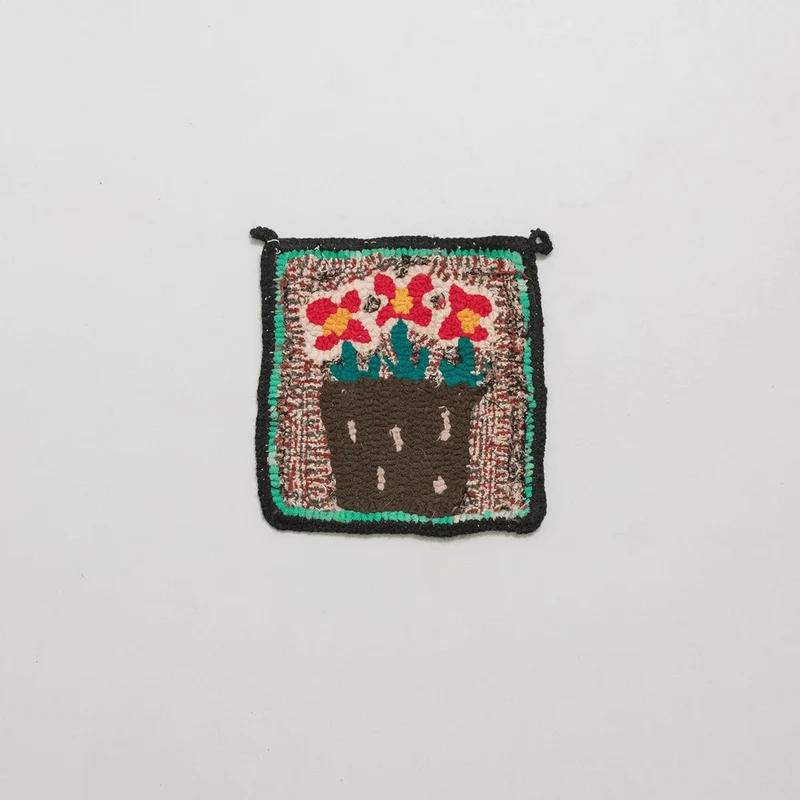 Manique à Motifs en Laine